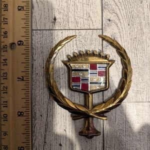 Cadillac Gold and Red Car Emblem